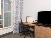 Desk Area and HDTV in Guest Room with City View