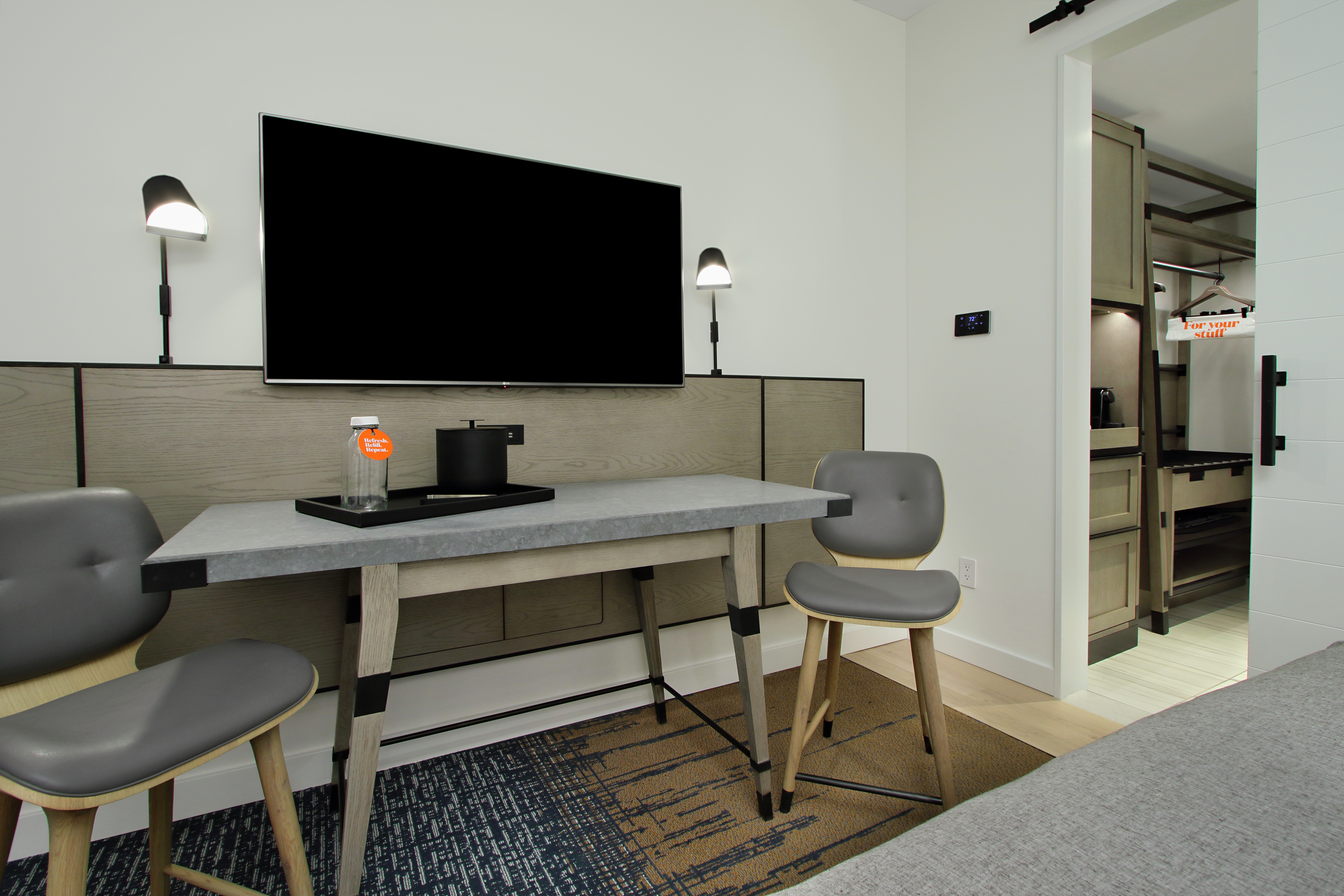 Guestroom With Desk And TV