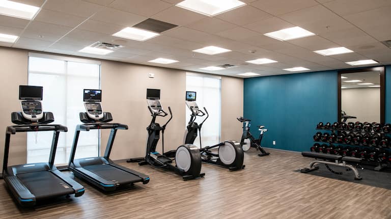 Treadmills Weights and Recumbent Bikes in Fitness Center