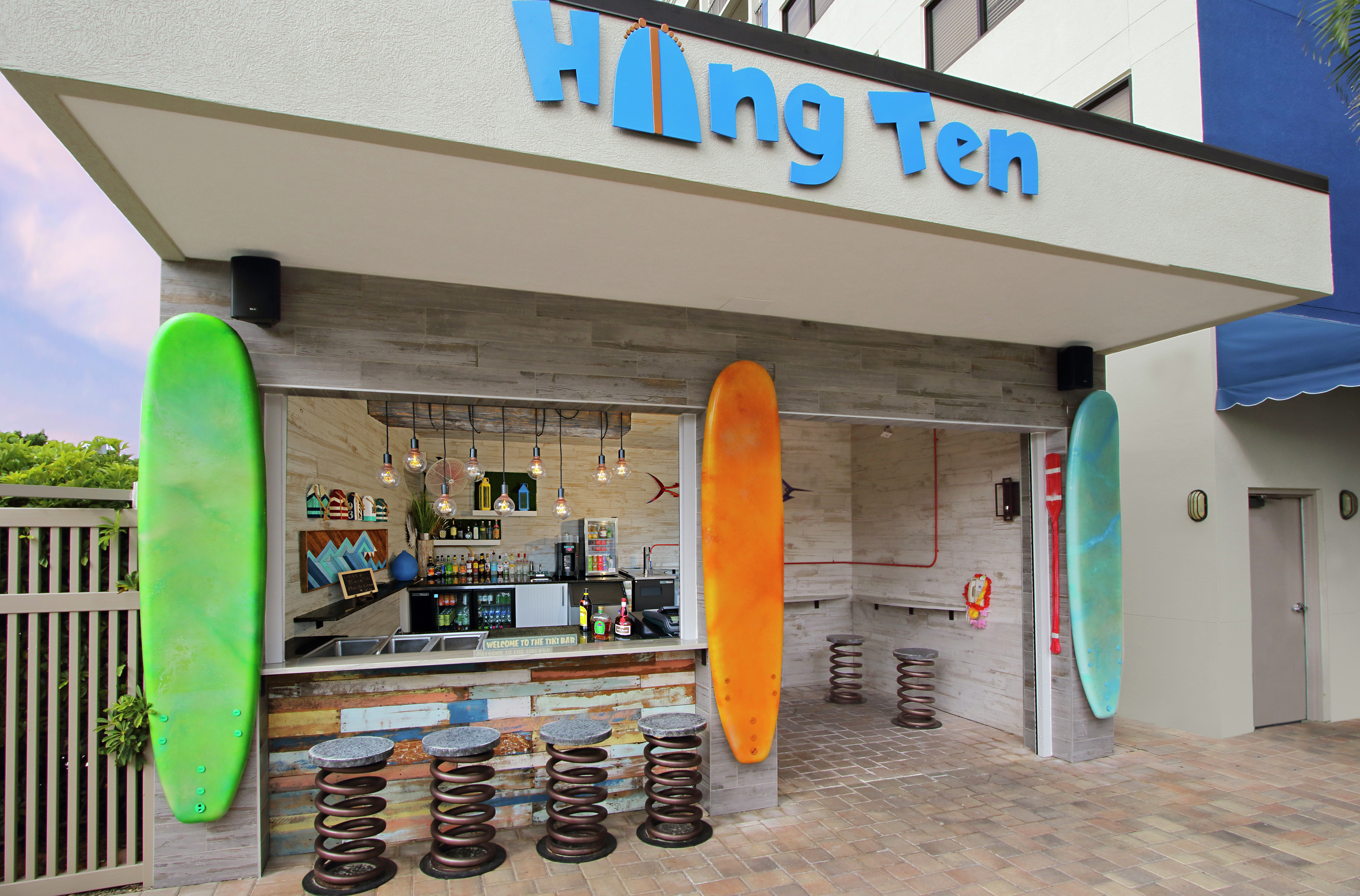 a surfing themed outdoor bar