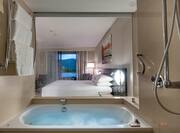 bath tub with view of room
