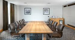 table and chairs in meeting room 