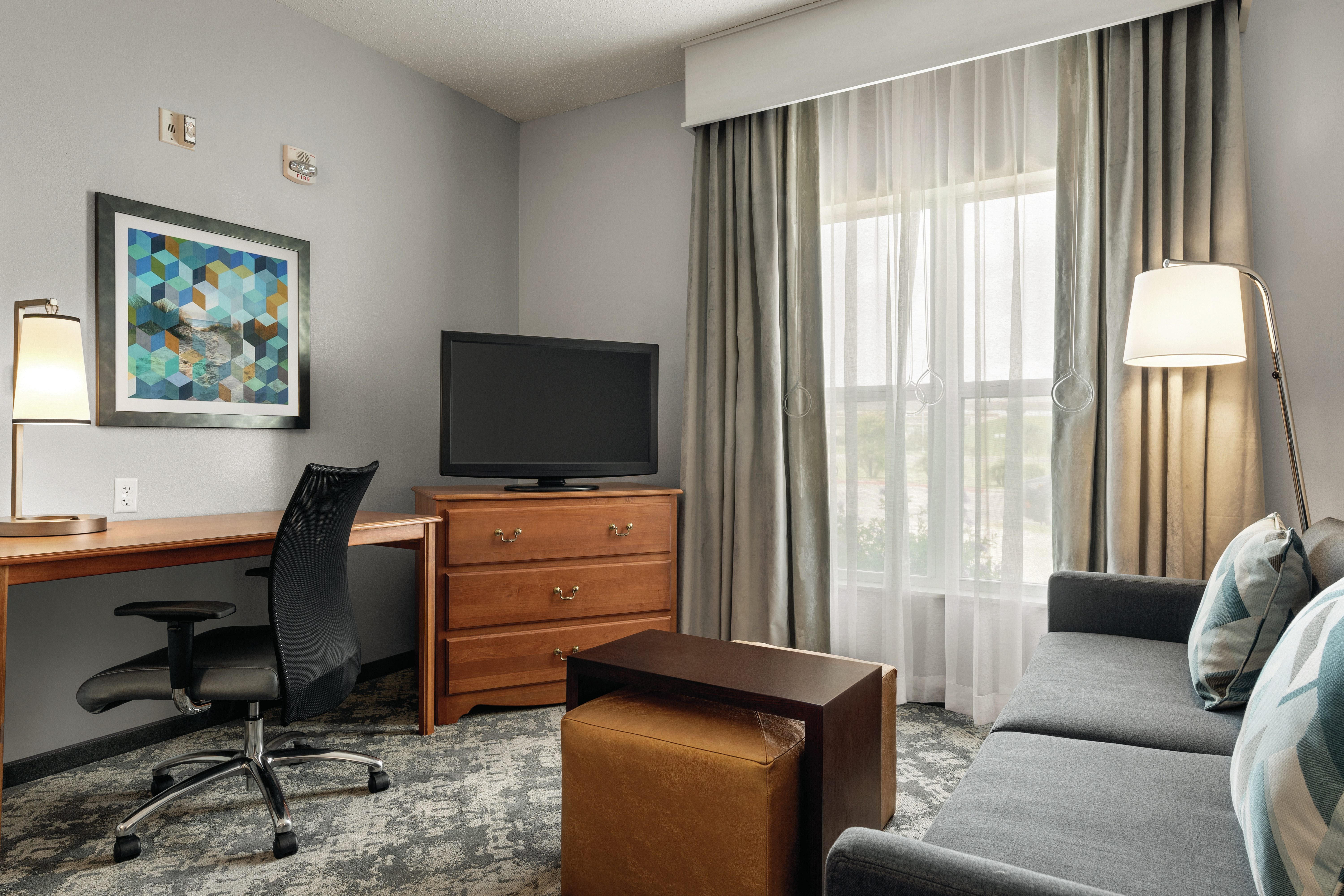 Guest Suite with Sofa, Footrest, Work Desk and TV
