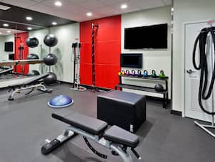 Fitness Center with Free Weights, HDTV and a Mirror