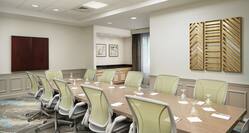 Boardroom with tables and chairs
