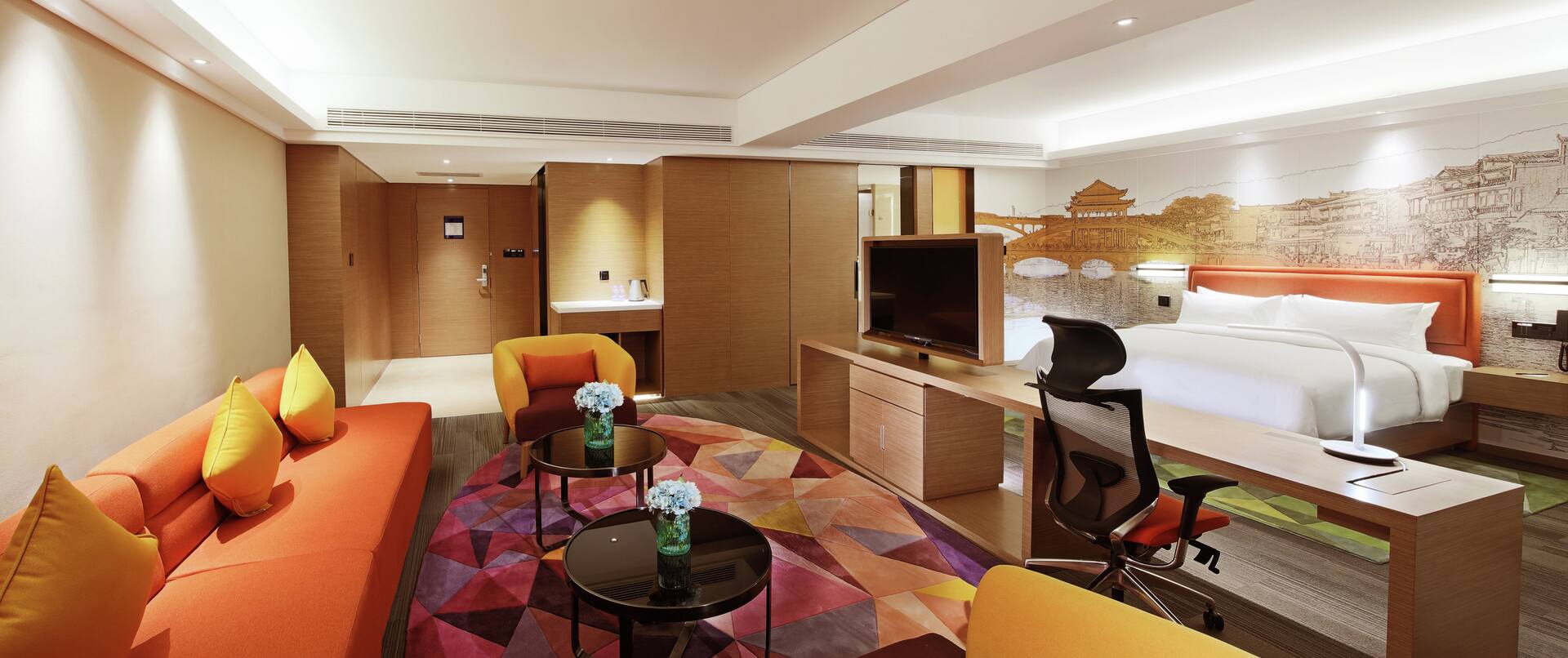 Suite with Luxurious King Bed, Work Desk, and Lounge Area 