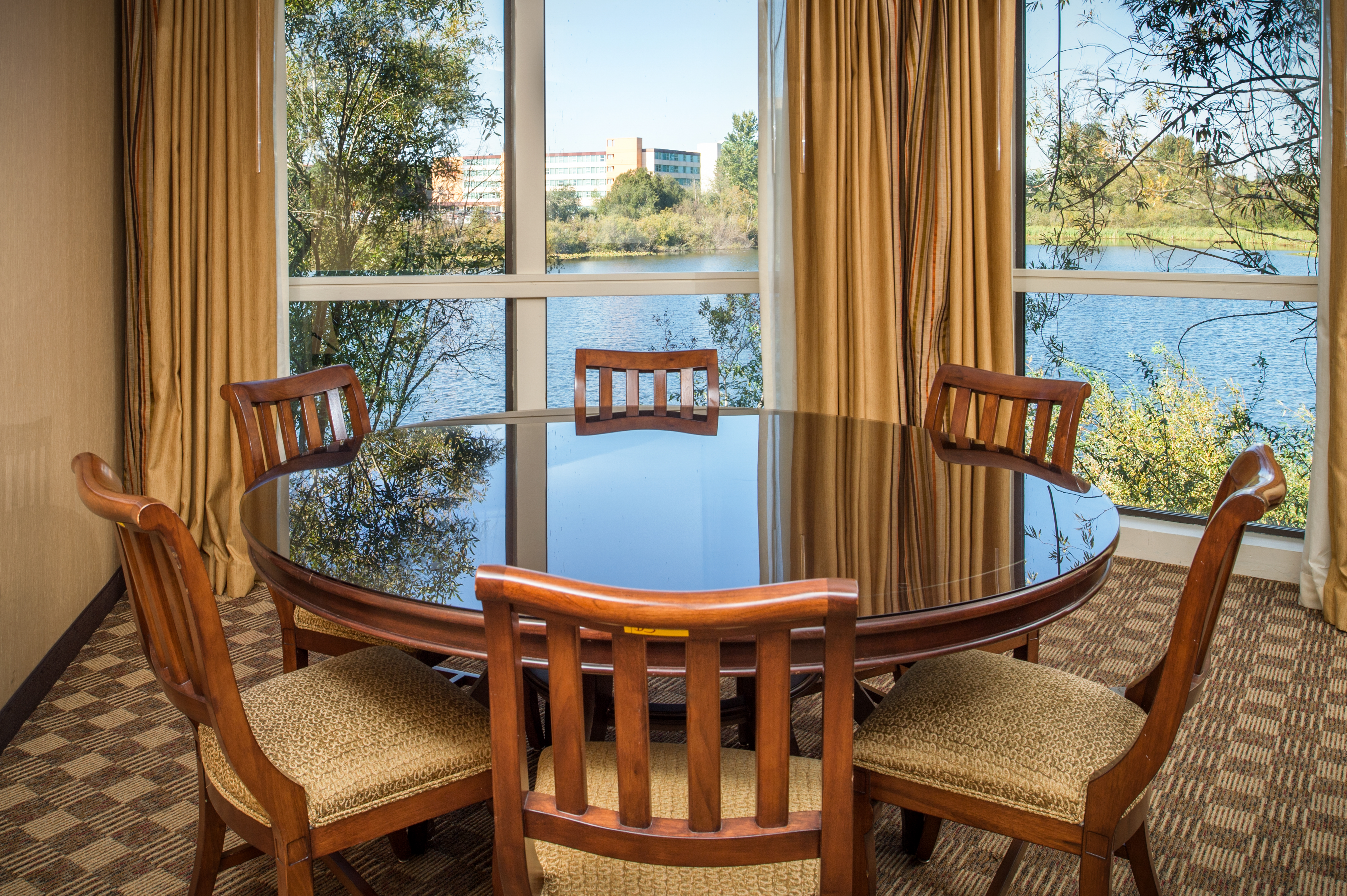 One King Suite Dining Table and Water View