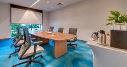 Boardroom Meeting Table with Office Chairs and Coffee Station
