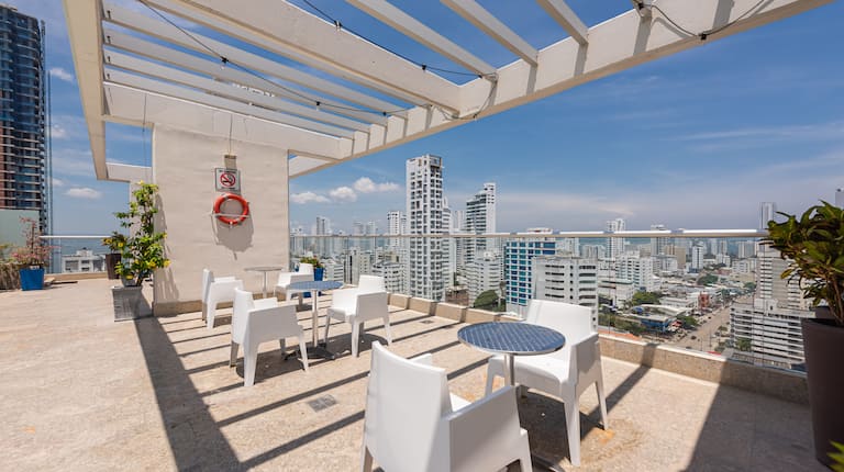 Outdoor Sitting Area on a High Floor with City View