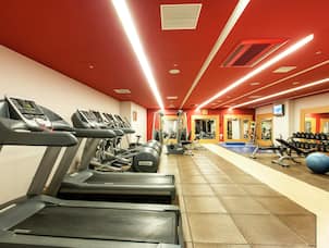 24 hour Fitness Center with Treadmills and Weights