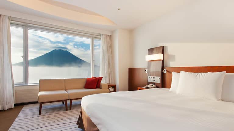 Bed shot with View of Mountain from Window