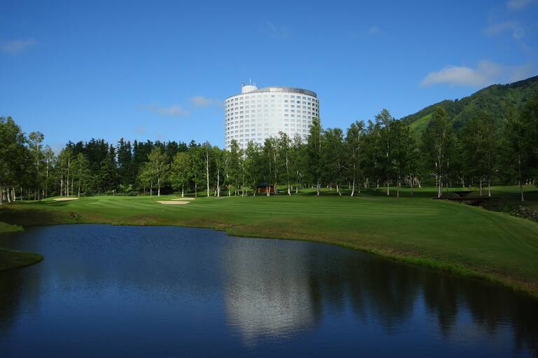 Golf course with hotel exterior
