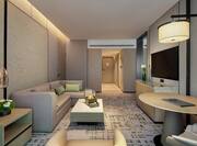Suite Living and Lounge area with Sofa and HDTV with Modern Furnishings