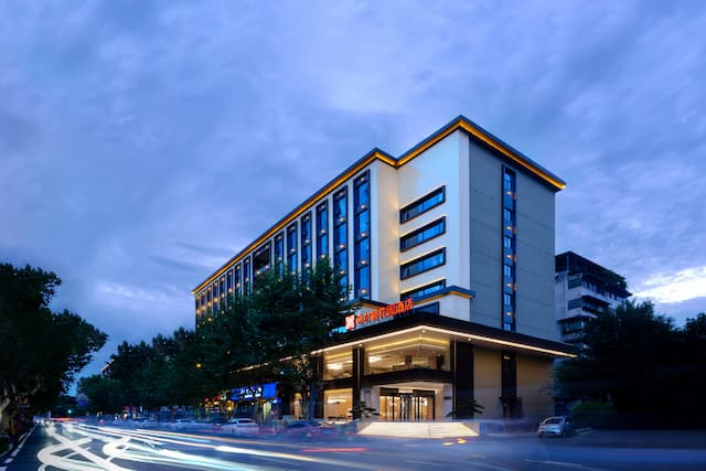 Exterior of hotel building at dusk