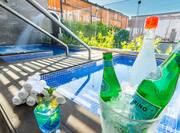 outdoor spa whirlpool with drinks