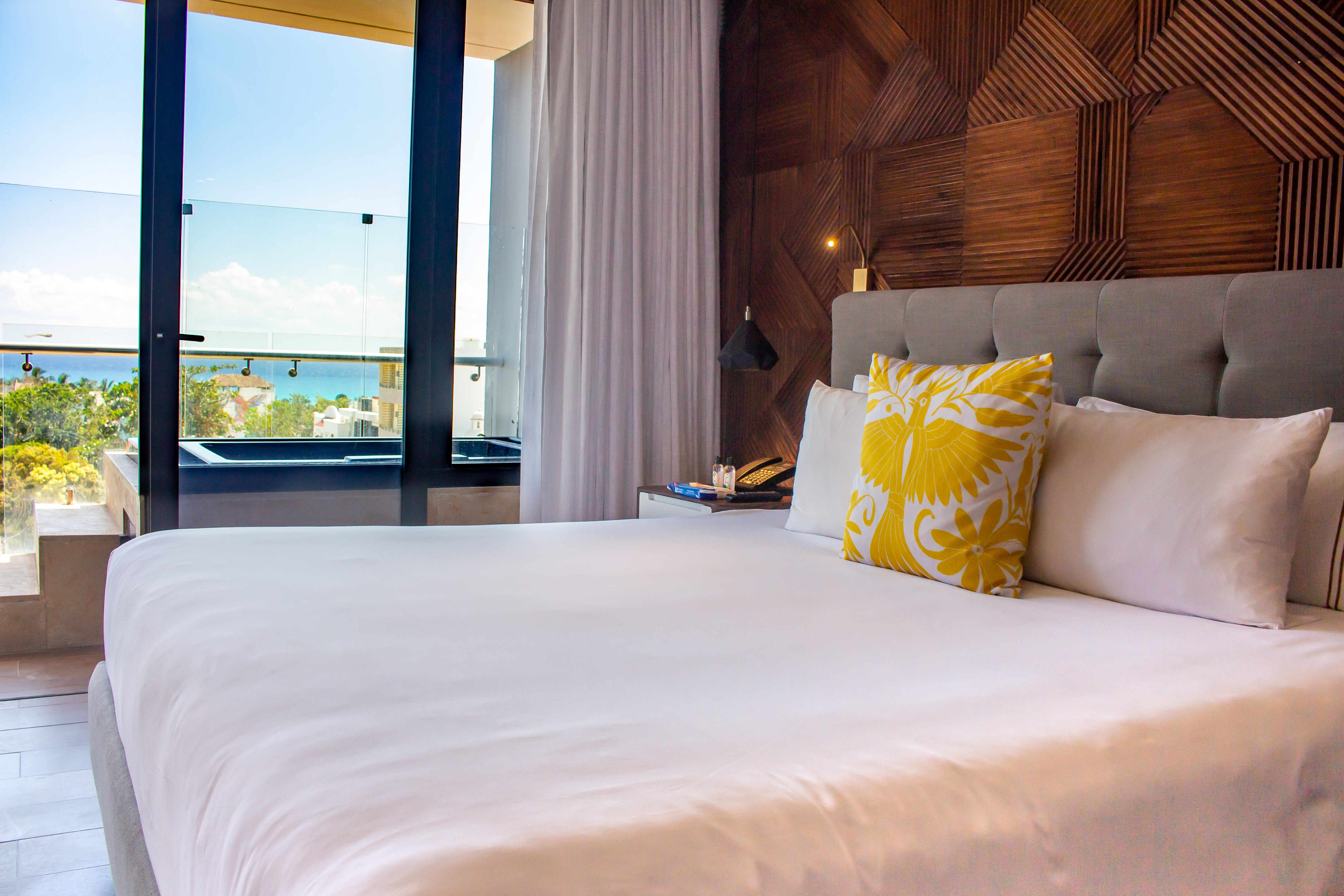 Large Bed in a Guest Room with Ocean View