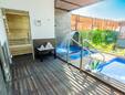 Spa Area with Outdoor Pool with Cascading Water