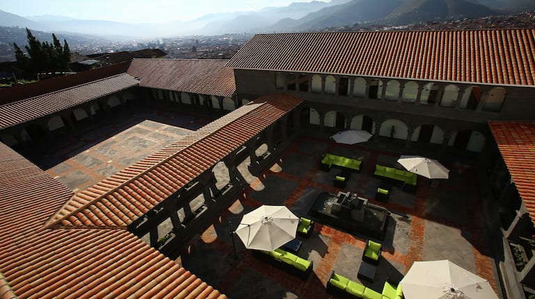 Aerial View of Sun Umbrellas and Seating in Courtyard