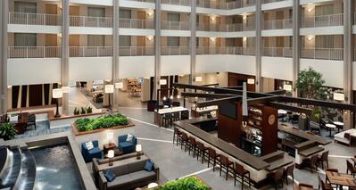 Embassy Suites with Fountain, Tables, Chairs, and Couches
