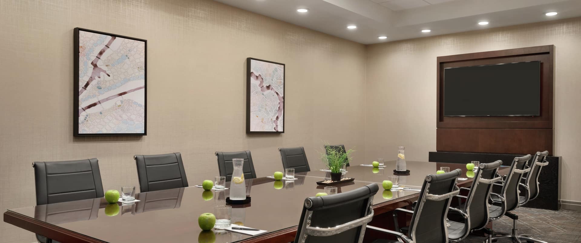 Embassy Suites Taylor Boardroom with Tables, Chairs, and Room Technology