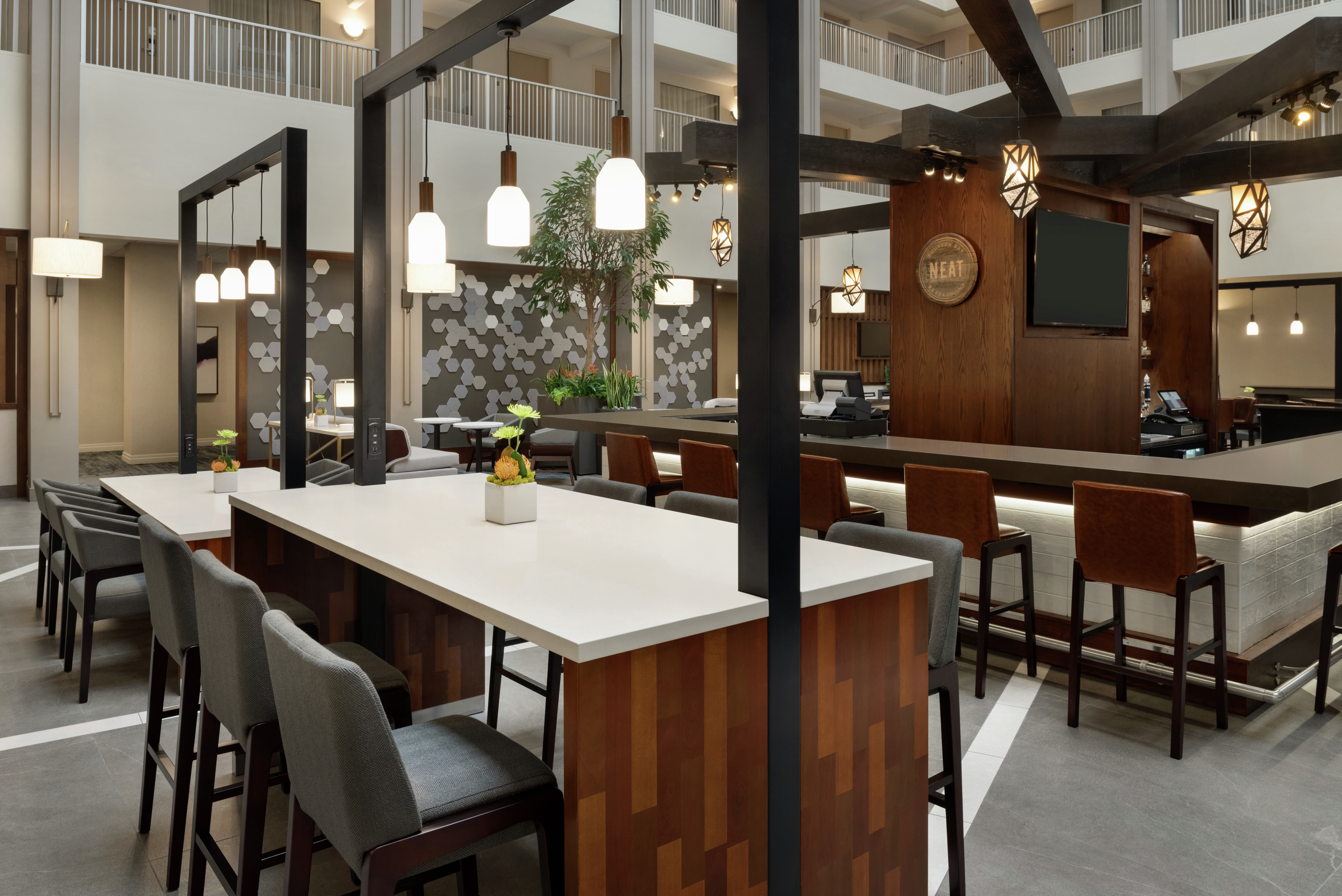 The Atrium Café & Bar with Tables, Chairs, and Room Technology
