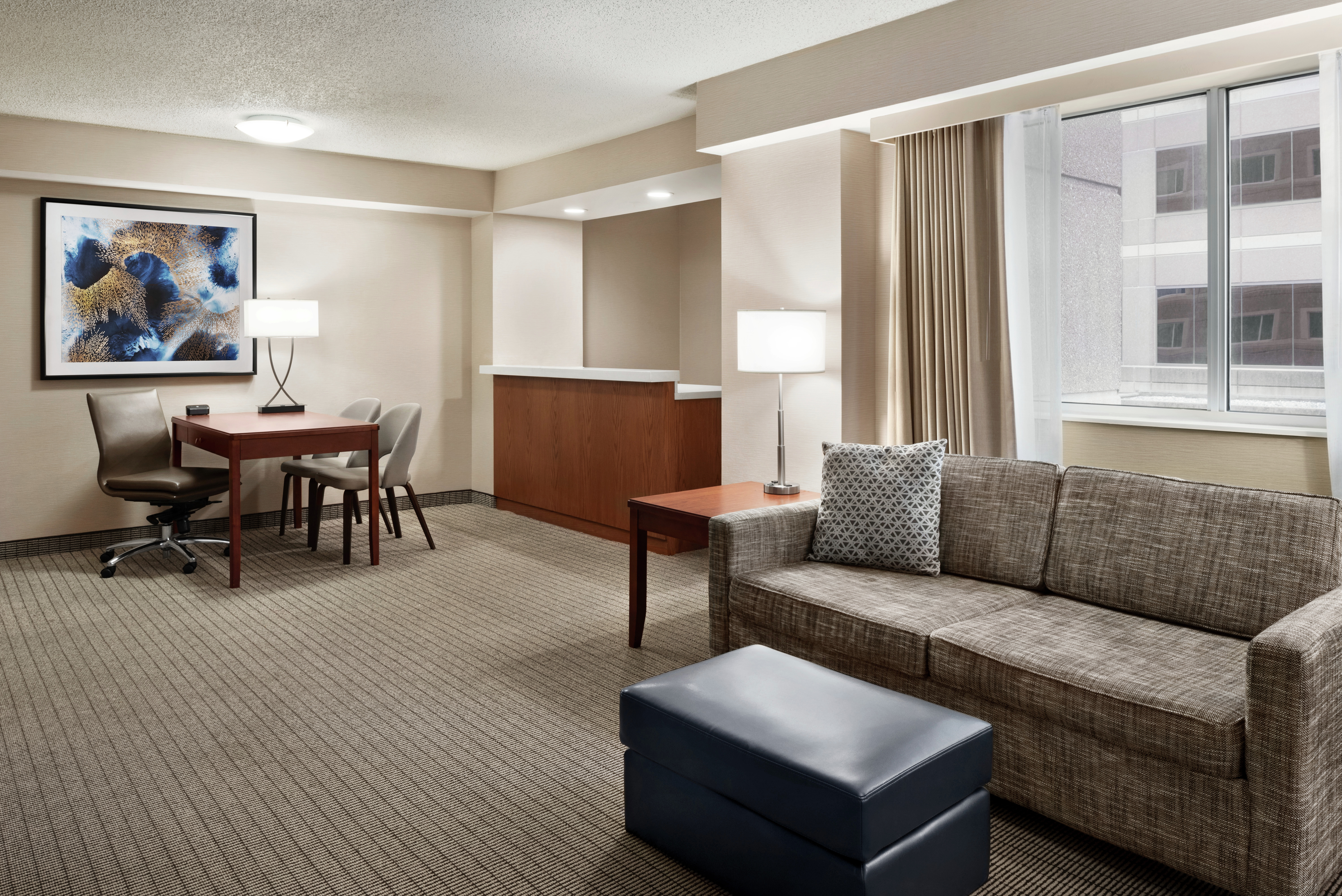 Executive Suite with Lounge Area and Work Desk with Chairs