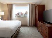 Premium King Suite with Bed, Room Technology, and Outside View