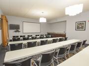 Meeting Room with Classroom Seating and Projector Screen