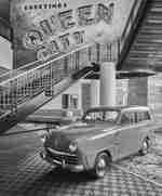 Car in lobby with staircase