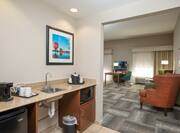  Mini-Fridge, Coffee Maker, Sink and Microwave with Opening to Living Area in King Accessible Studio Suite