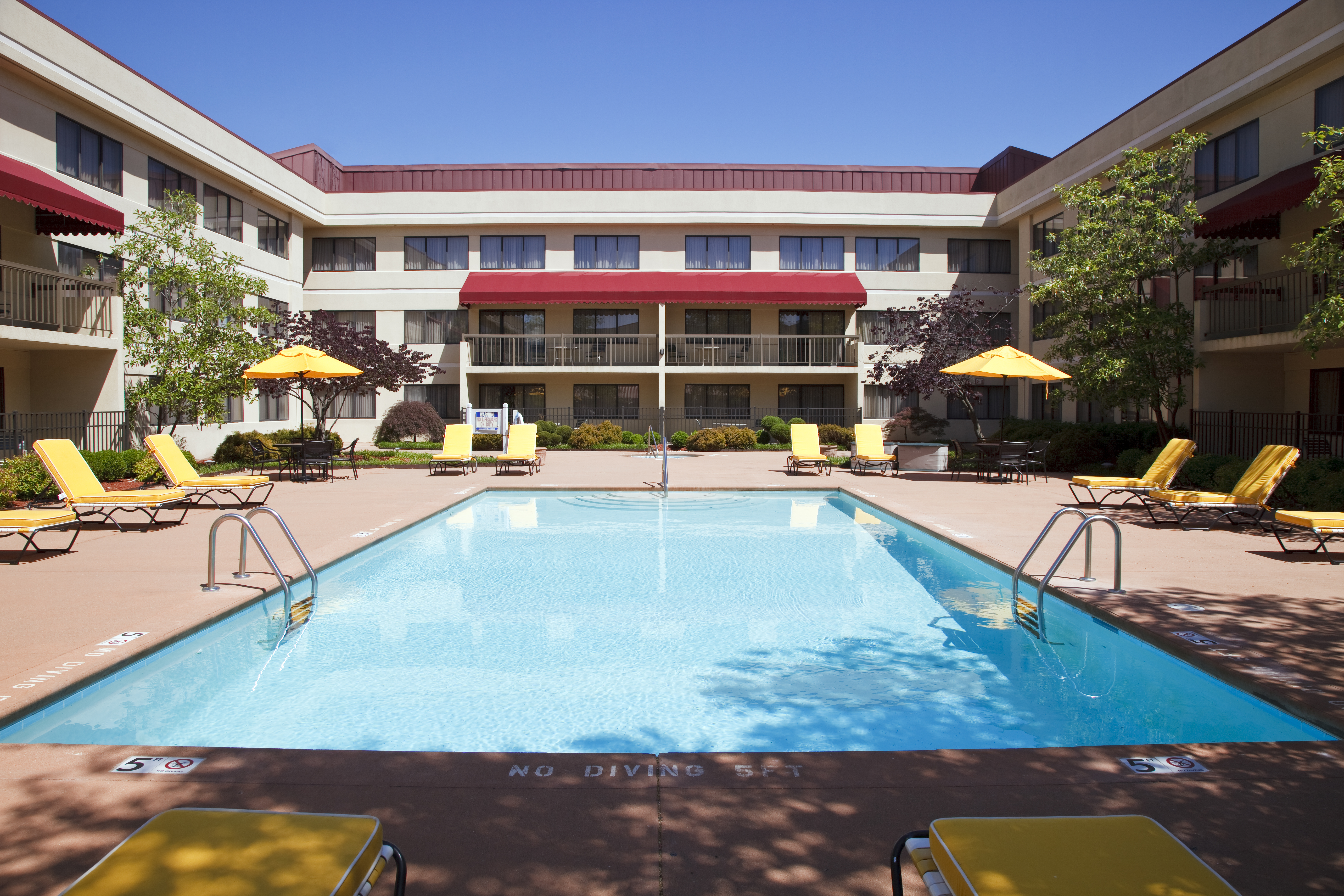 Hotel Exterior with Outdoor Pool