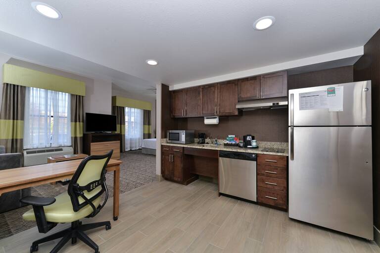 Accessible Studio Suite with Kitchen, Work Desk, and HDTV 