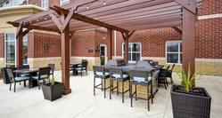 Patio Area with Seating and Grills