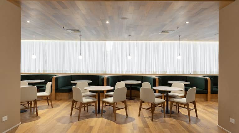 Restaurant dining room with tables and chairs