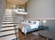 multi level suite with two double beds and stairs