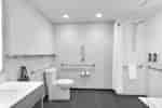 Accessible Guest Bathroom with Roll-In Shower