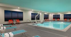 Indoor Swimming Pool with Deck Chairs and Disability Access
