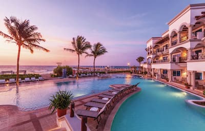 Exterior Pool at Dusk with Ocean View