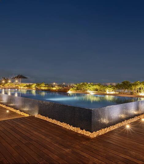Outdoor rooftop pool at night