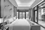 客房配有床、休息区和阳台通道