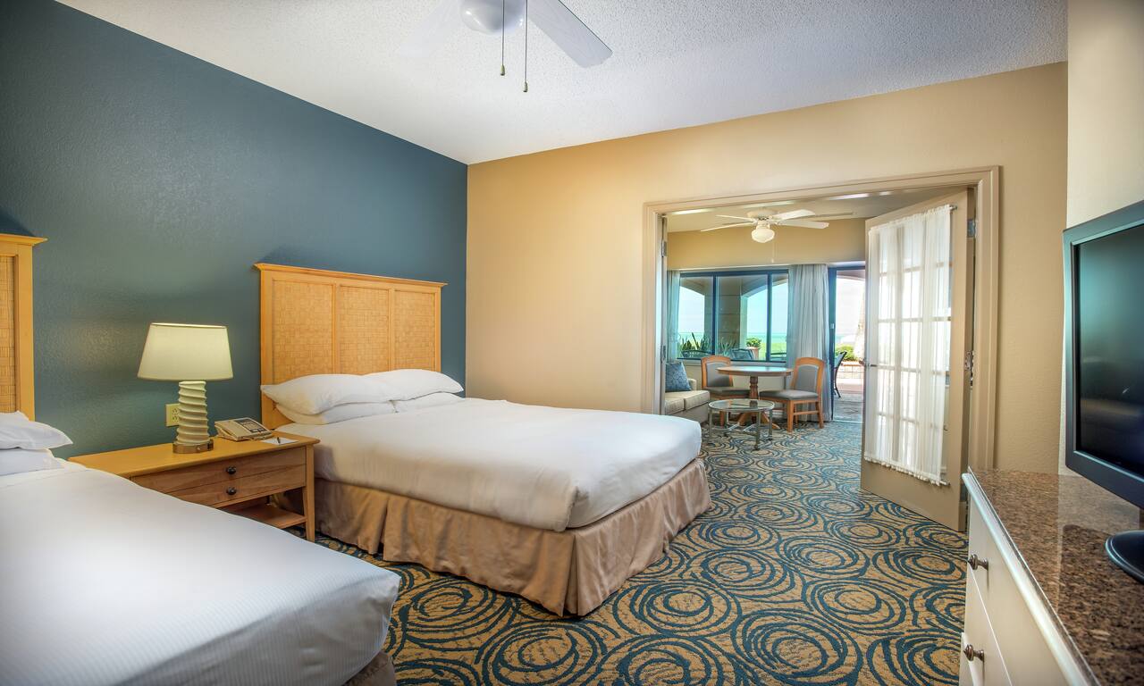 Accessible Guestroom with Two Queen-Sized Beds, Room Technology, and Lounge Area