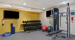 fitness center with weights and machines