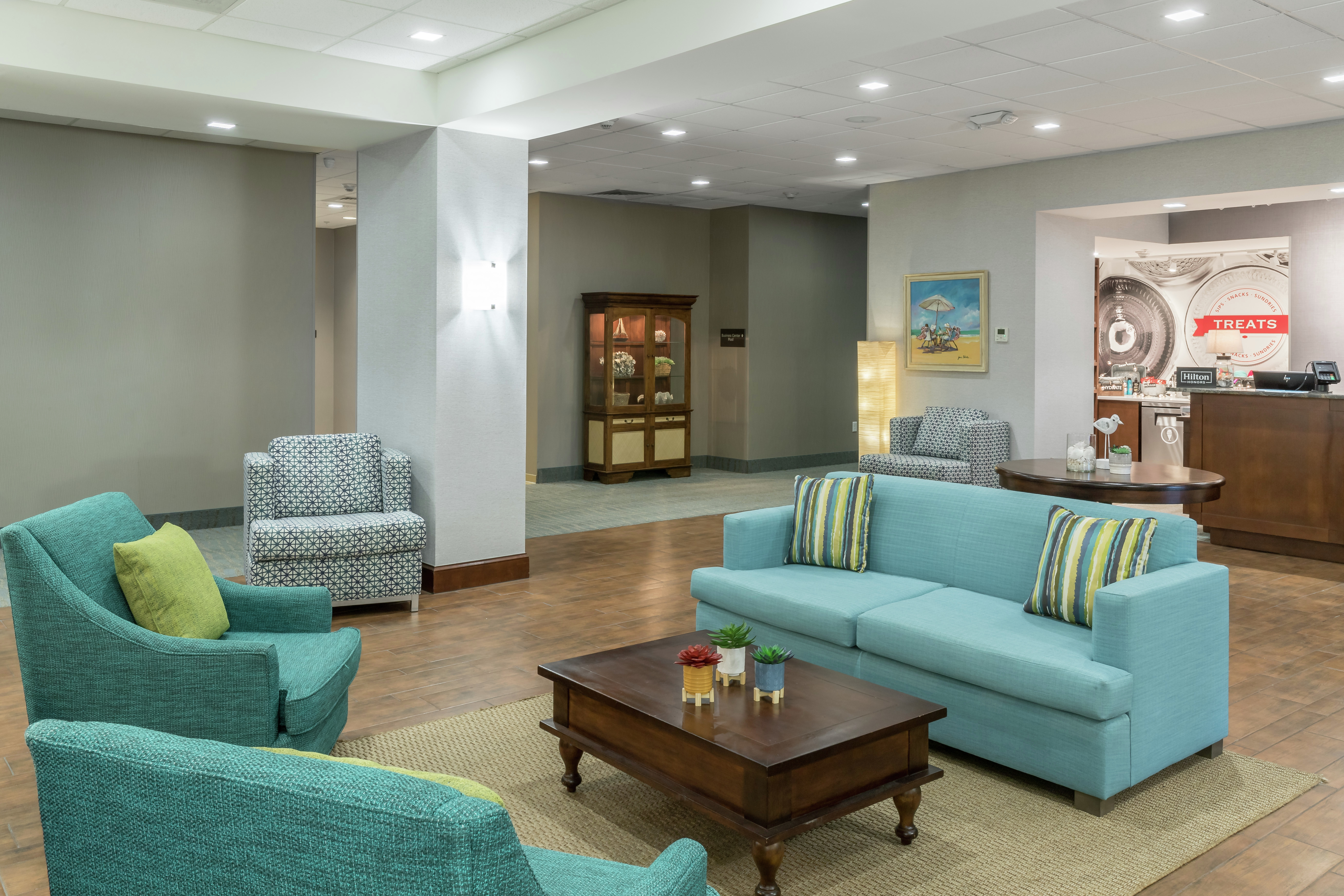Lobby Seating Area with Sofa, Armchairs and Coffee Table