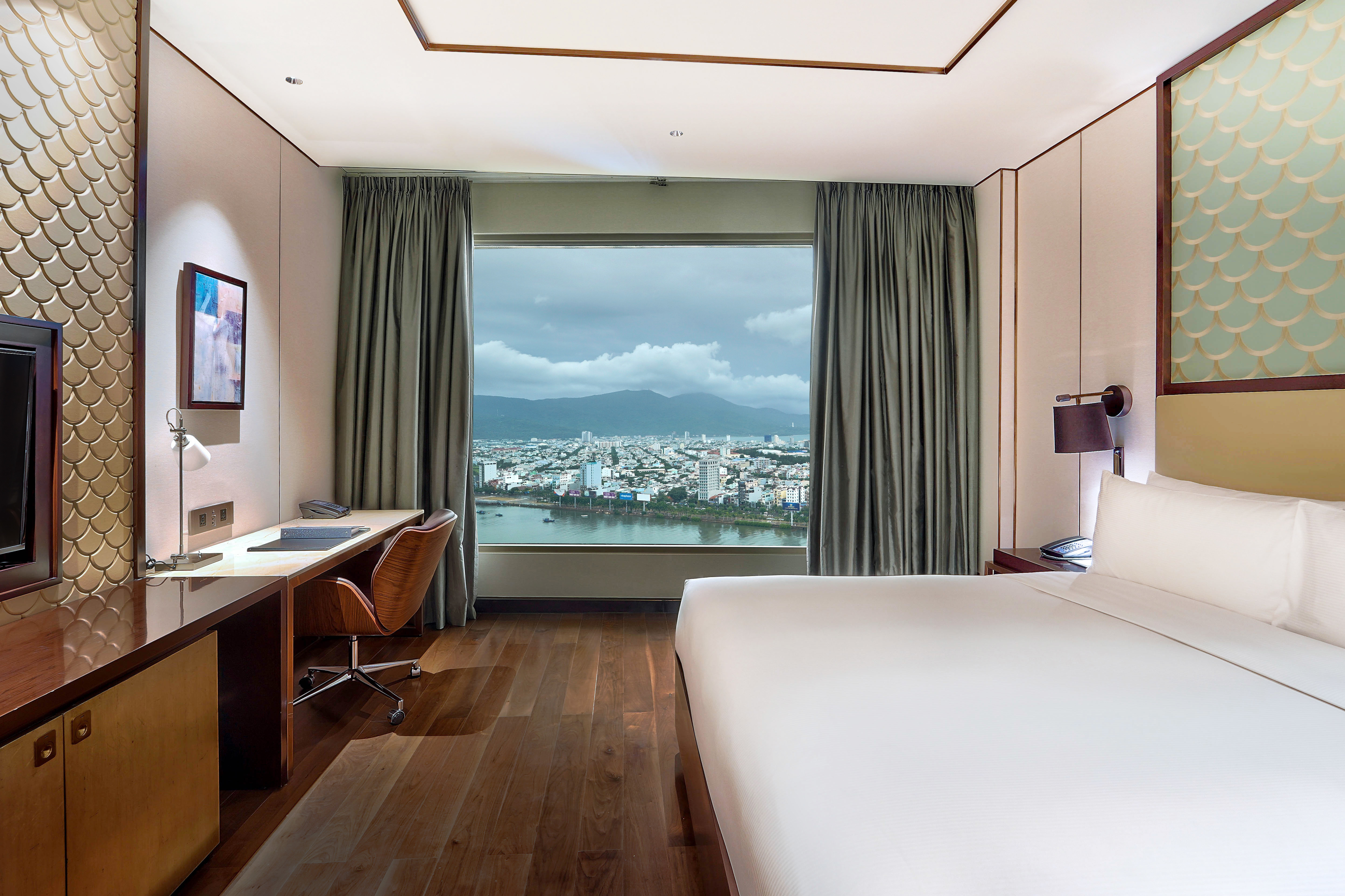 Presidential Suite Bedroom with Desk and City View
