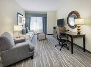 Suite Living Area, Work Desk and TV in One Bedroom Suite