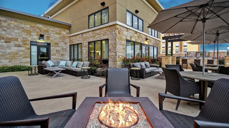 Exterior Patio with Lounge Areas and Fire Pit 