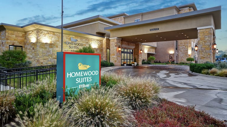 Hotel Exterior with Lit up Sign