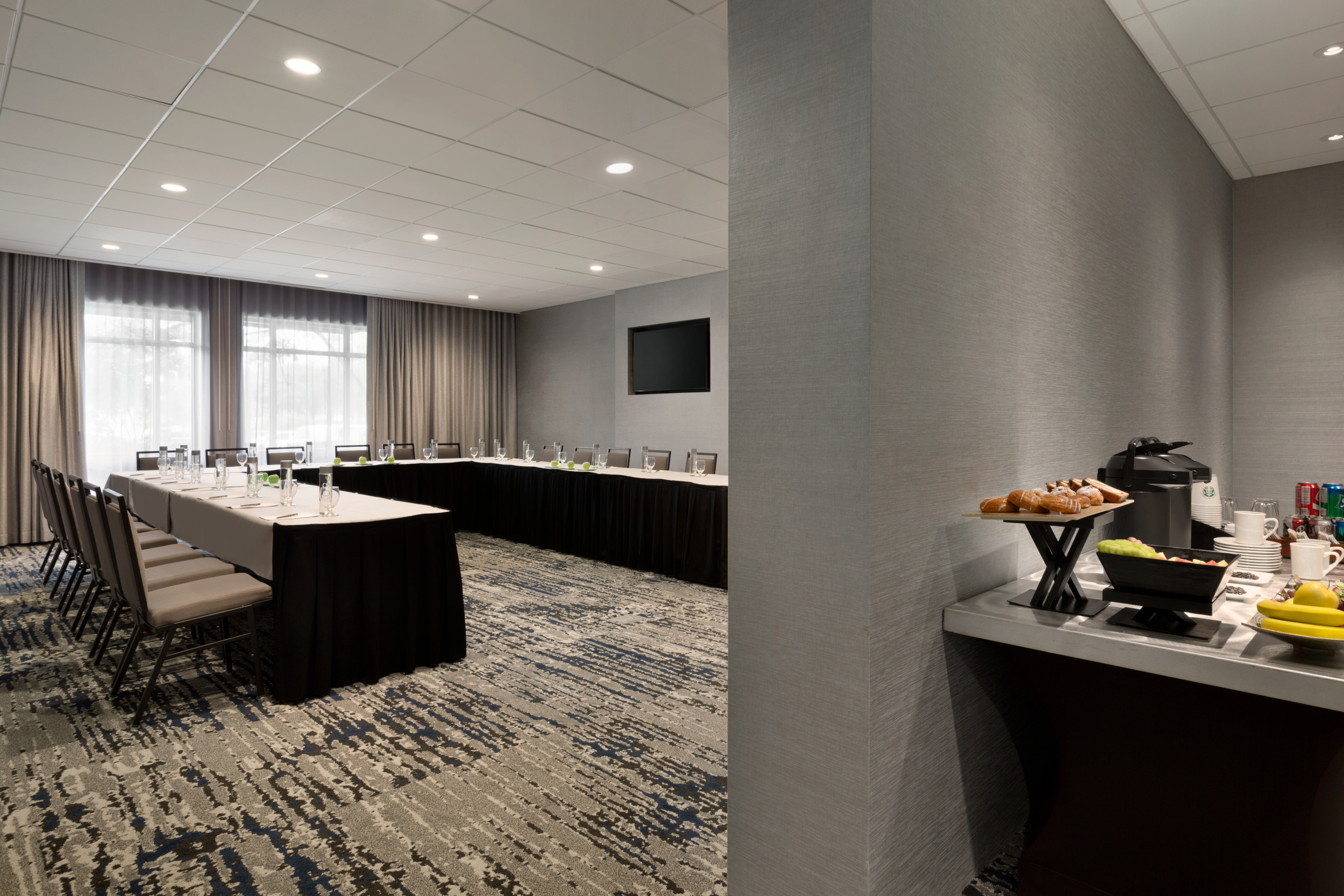 Meeting Room with Conference Table and Snack Table