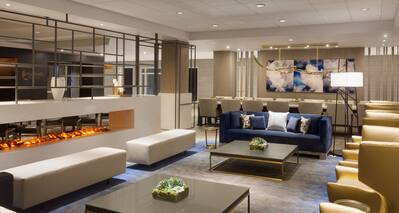 Lobby Seating Area with Sofa, Seats and Two Coffee Tables