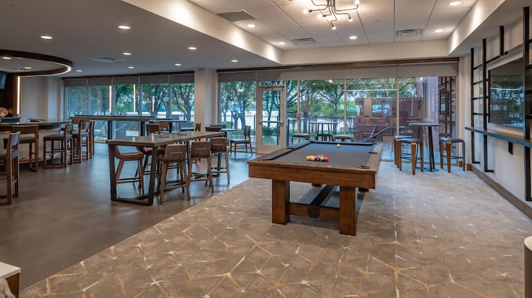 Pool Table and Lounge Seating in Game Room